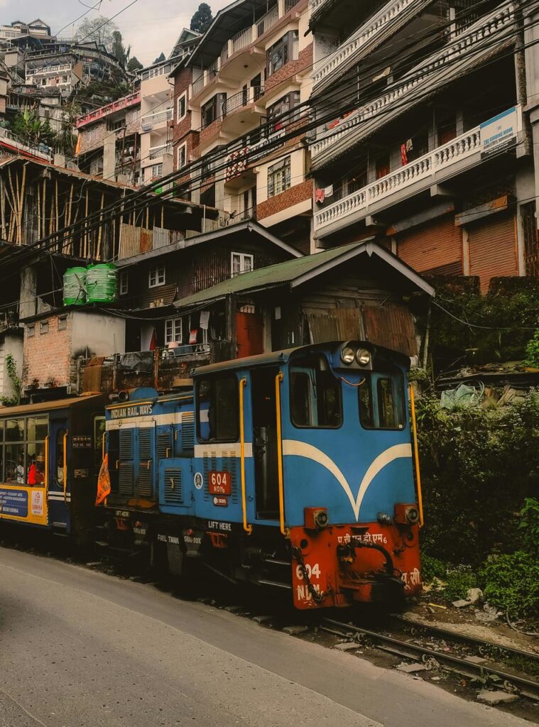 Darjeeling Toy Train running through Darjeeling town during Toy Train Express tour.
