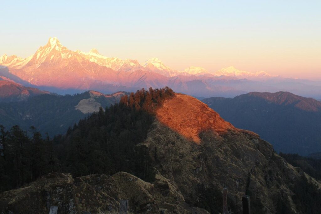 Golden sunrise touching Kanchenjunga peak during sunrise Escape tour in Darjeeling.